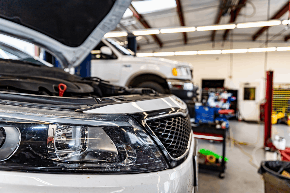 National Car Care Month, auto repair in Greer, SC at Eastside Automotive. Image of a vehicle in the shop with the hood open, highlighting routine maintenance, inspections, and preventative care to keep your car running reliably and avoid costly repairs.